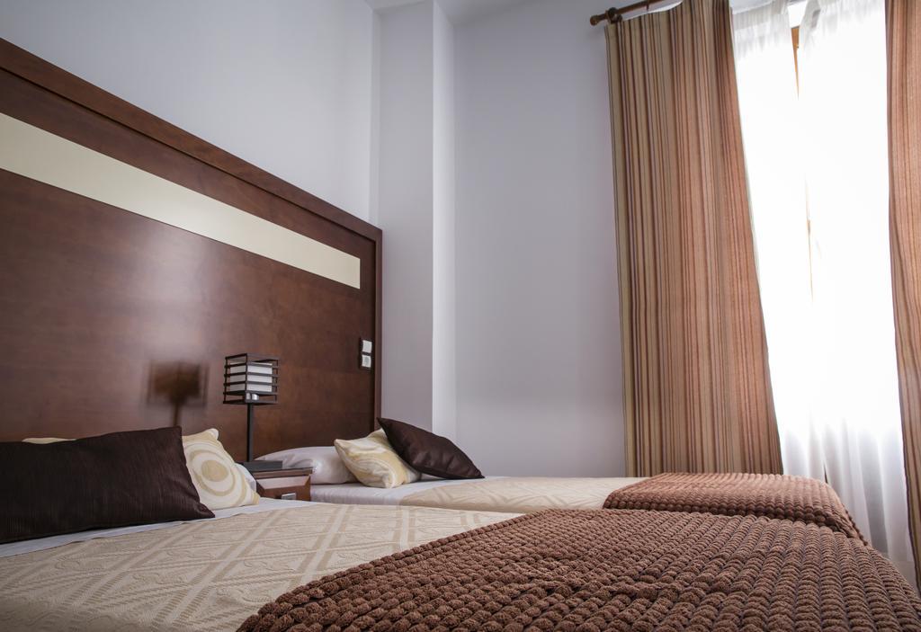 Apartamentos Casa De La Lonja Granada Szoba fotó